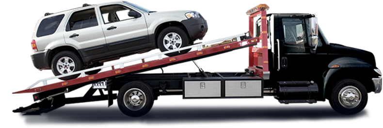 Tow truck carrying a vehicle